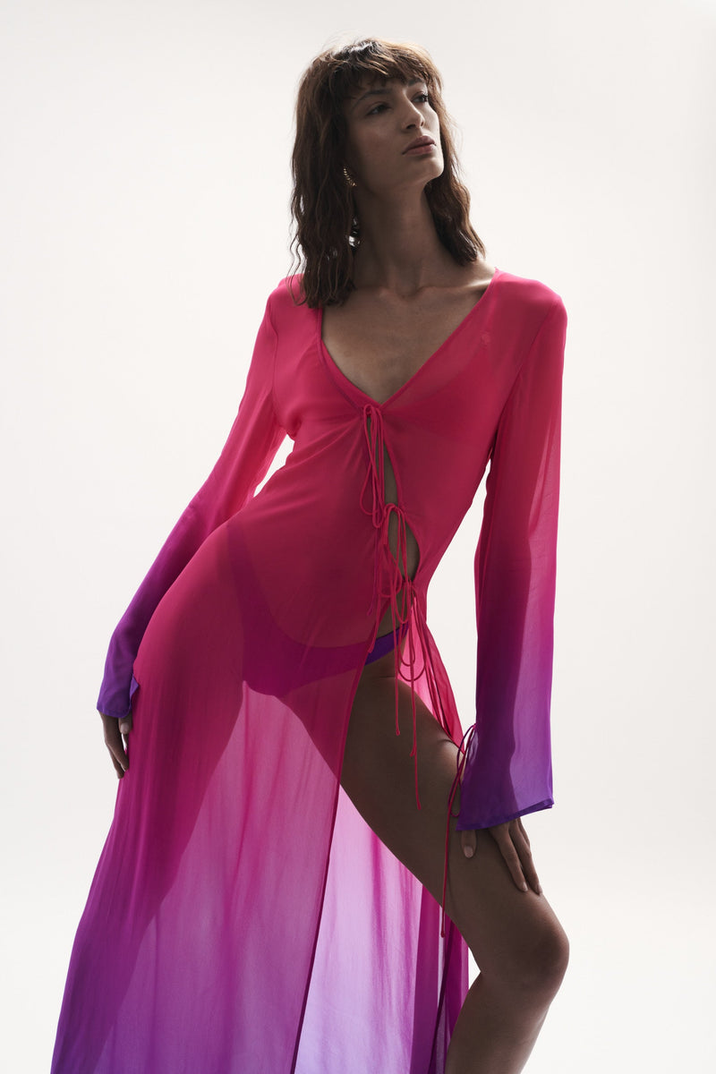 model leaning view womens resort wear designed as high quality resort wear from sommer swim swimwear australia - pelicano berry crush is a pink and purple gradient robe dress