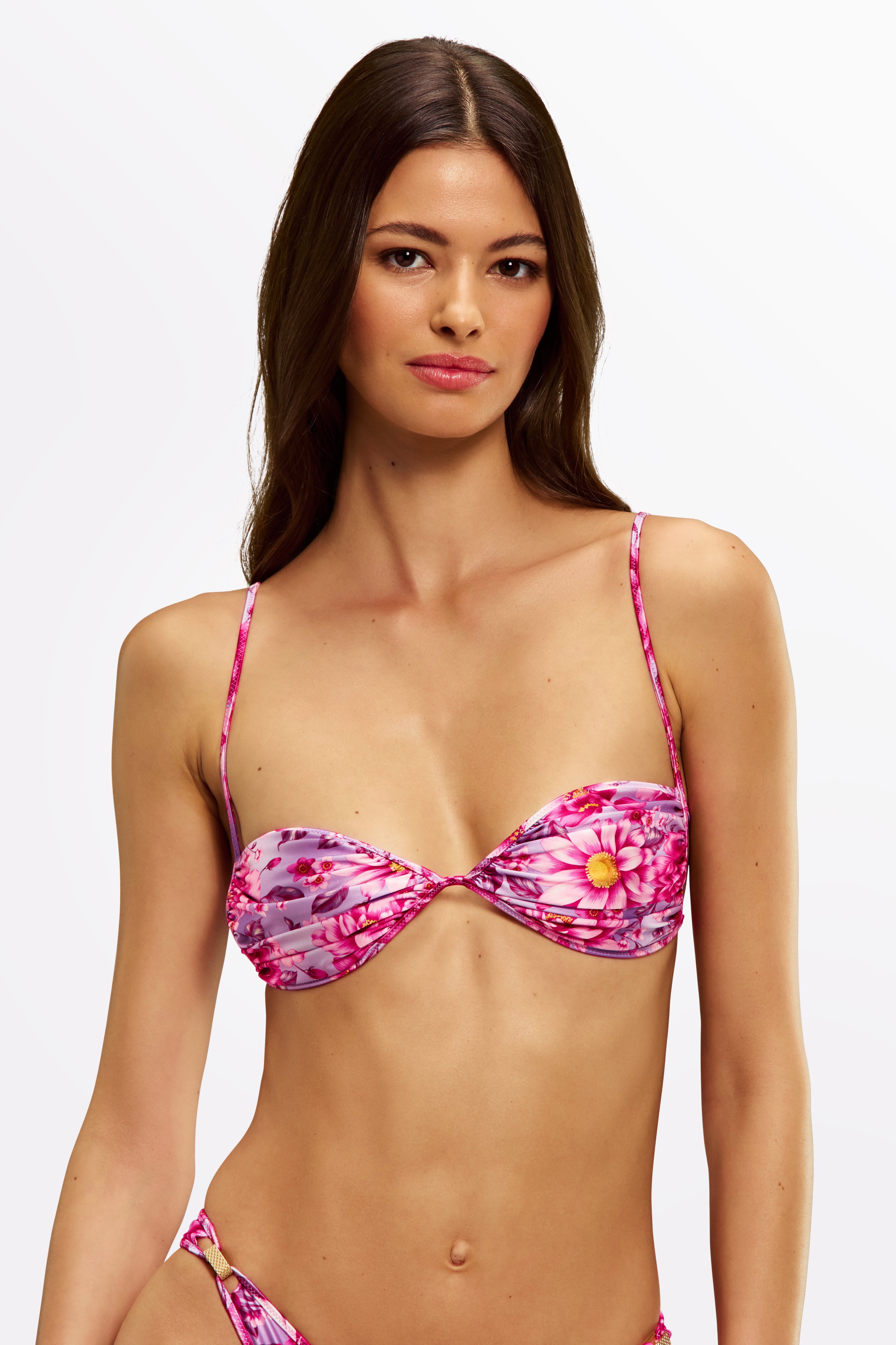 Woman wearing a pink floral ana azalea bralette bikini from Sommer Swim Aus