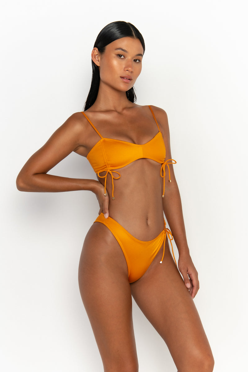 side view womens swimwear designed as high quality bikini from sommer swim swimwear australia - adriana turmeric is a light orange bikini with high waisted bikini bottom