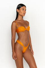side view womens swimwear designed as high quality bikini from sommer swim swimwear australia - sadie turmeric is a light orange bikini with brazilian bikini bottoms